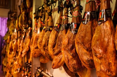 why hang iberian serrano hams